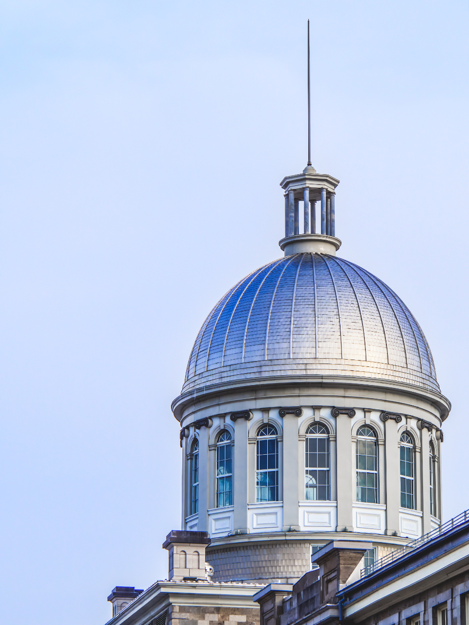 A government capitol dome against a clear sky